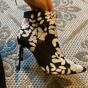 White and black flower printed pointy toe heeled booties from Zara